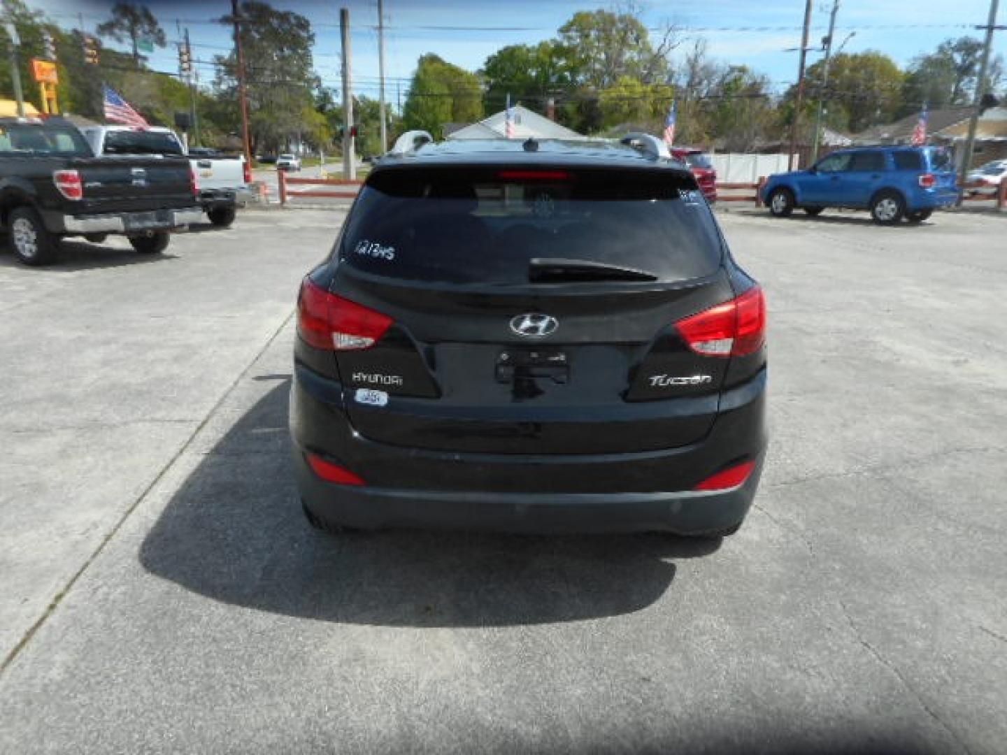 2013 BLACK HYUNDAI TUCSON GLS; LIMITED (KM8JU3AC9DU) , located at 1200 Cassat Avenue, Jacksonville, FL, 32205, (904) 695-1885, 30.302404, -81.731033 - Photo#3